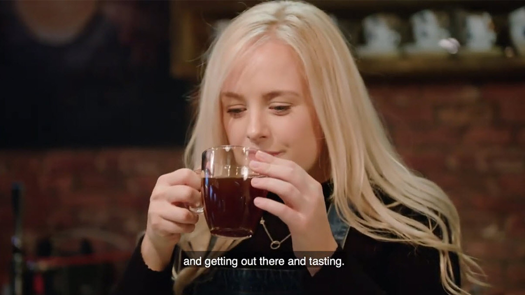Girl tasting coffee