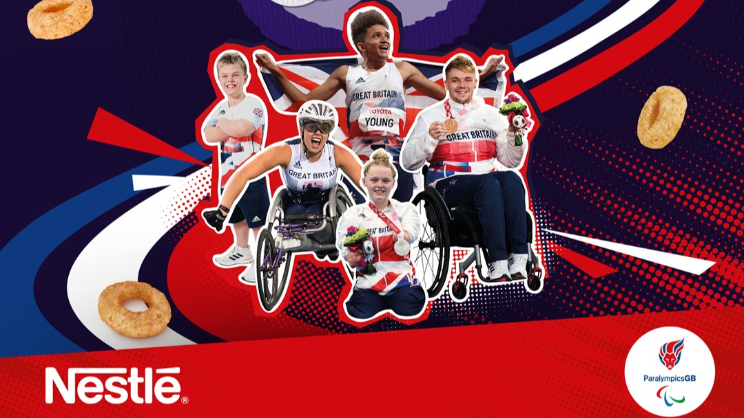 A group of five Paralympic athletes against a red, white and blue backdrop.