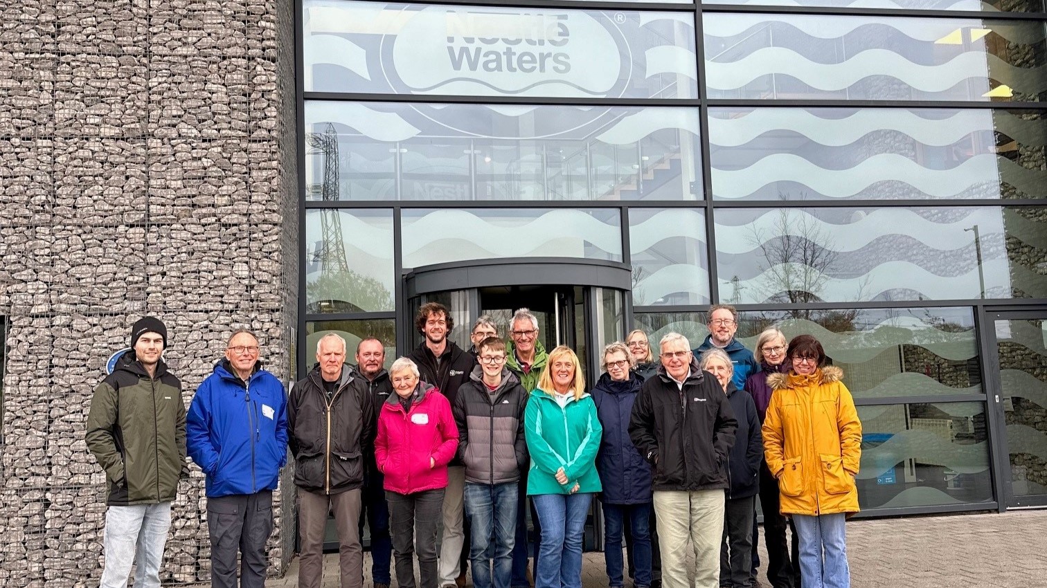 Nestlé Waters and Derbyshire Wildlife Trust volunteers standing outside Nestlé Waters Buxton factory 