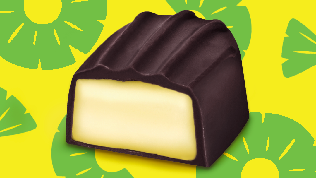 Pineapple Creme sweet in front of pineapple background