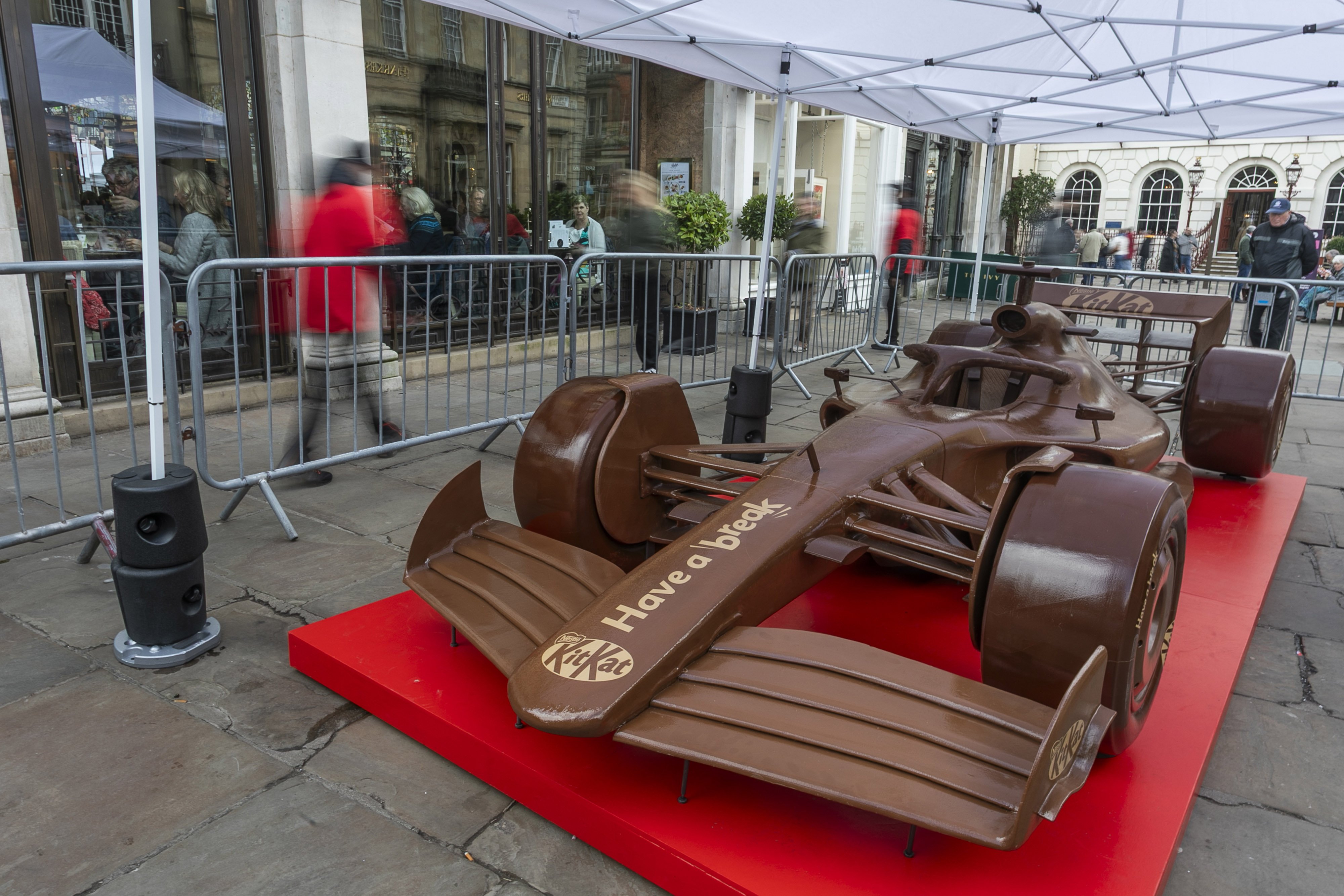 KitKat F1 car on a platform in St Helen's Square in York