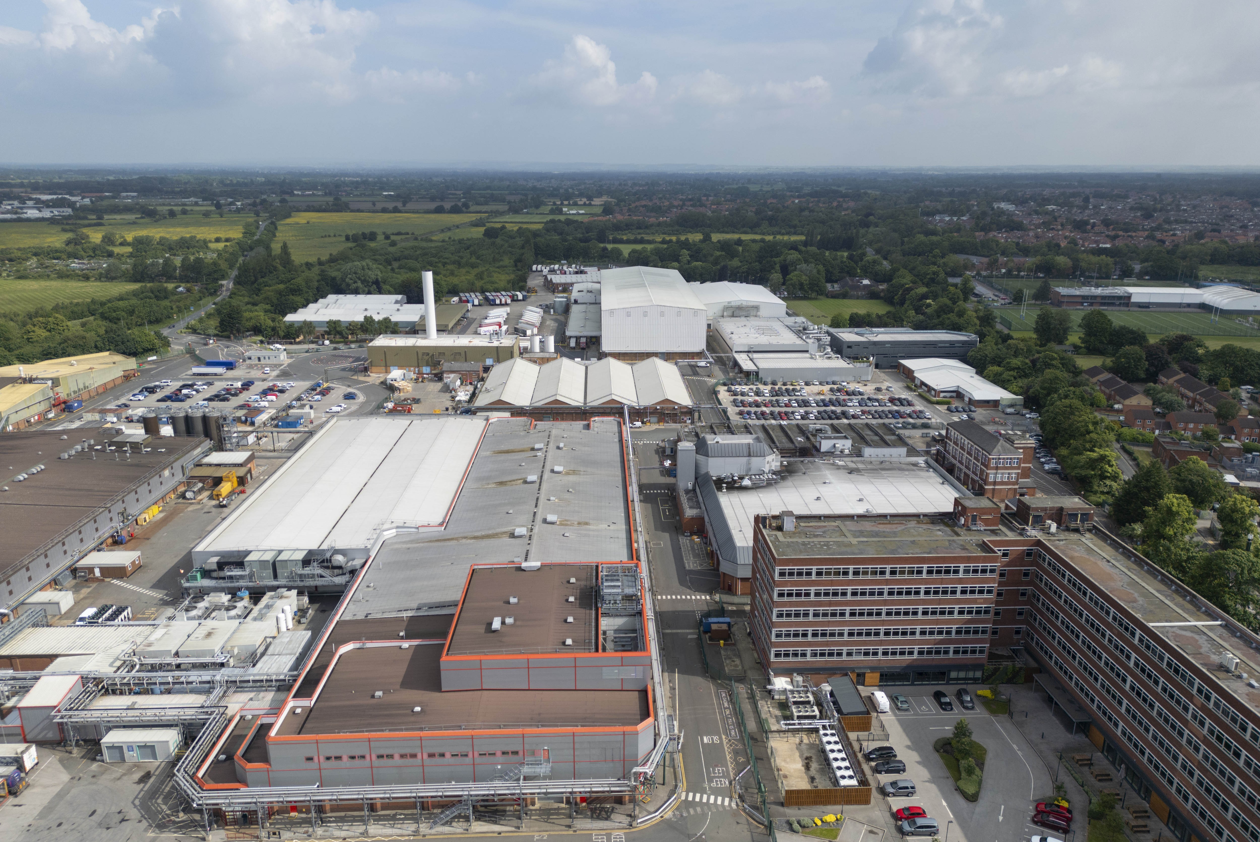 A drone image of the entire Nestlé York site, including the York KitKat factory. A sunny backdrop against the site.