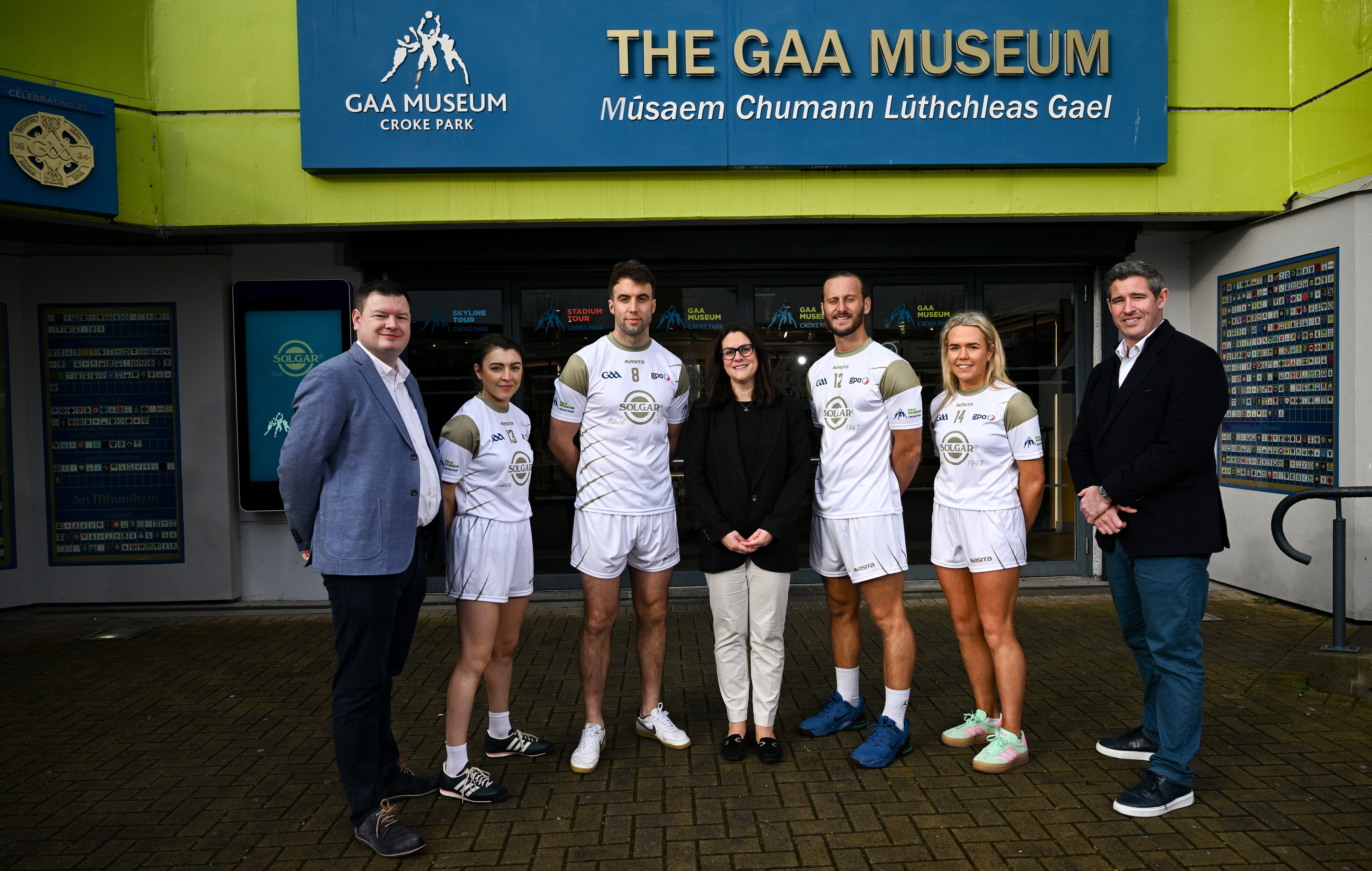 Six people standing outside the GAA Museum.
