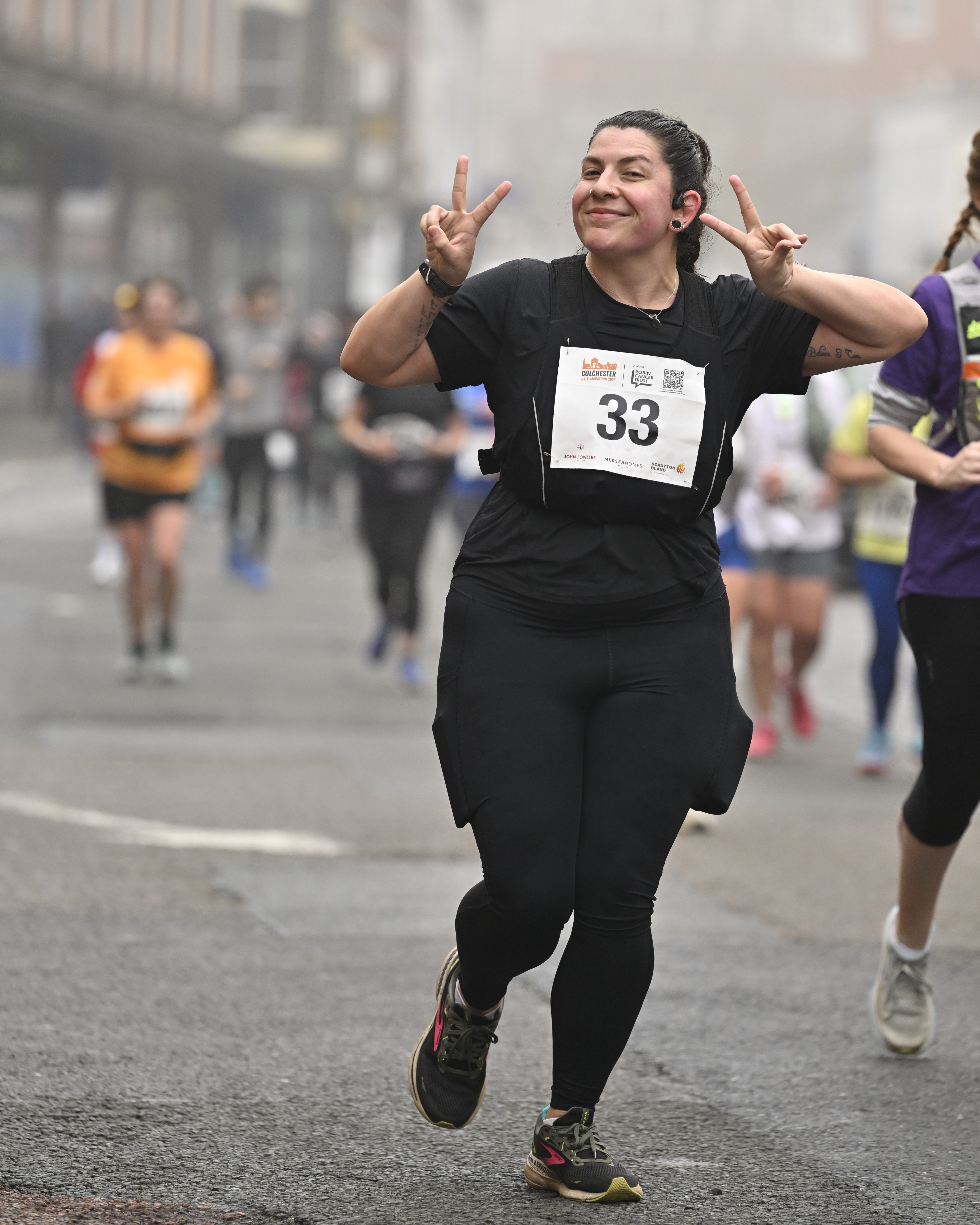 Woman running in a race.