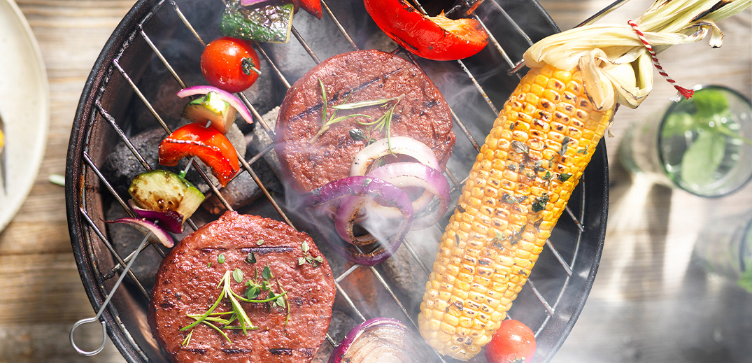 Vegan burgers and vegetable on barbeque