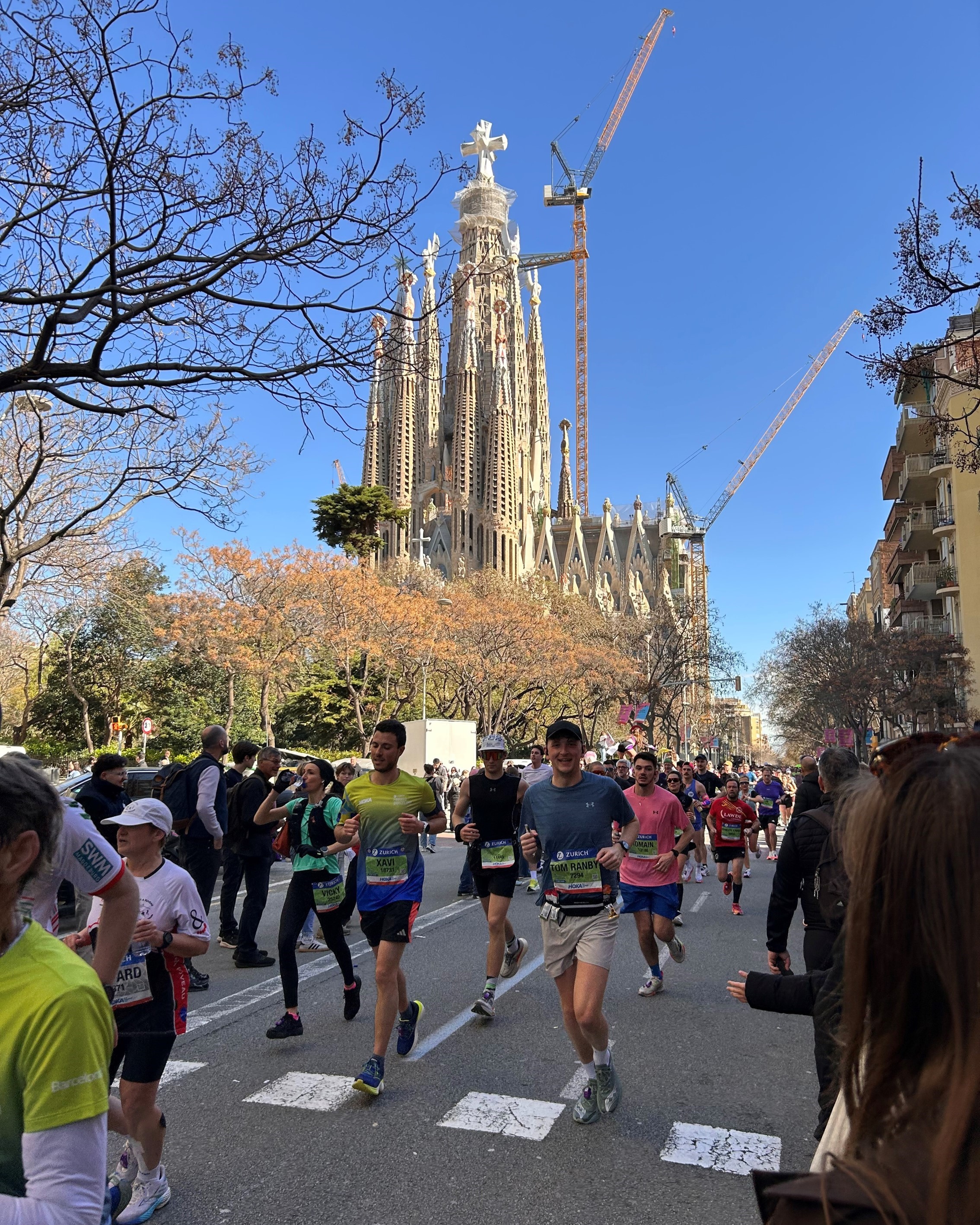 Man running a marathon in a city.