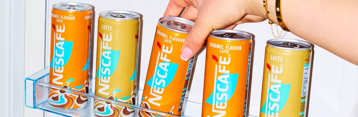 Nescafé ready-to-drink iced lattes cans in a fridge