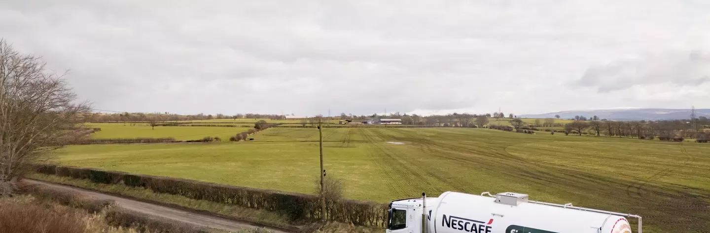 Nescafé and First Milk HVO truck driving on a country side lane
