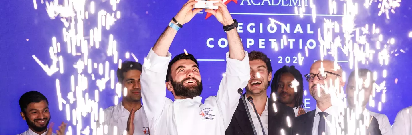 Vasyl Fysiuk rasing his trophy