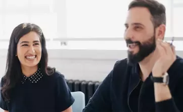 Man and woman smiling