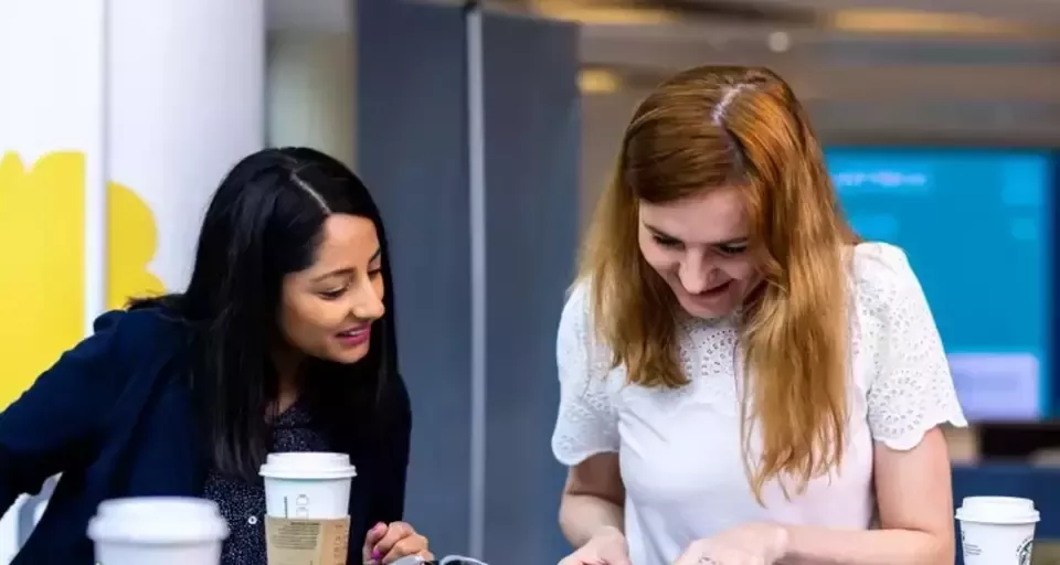 two girls working