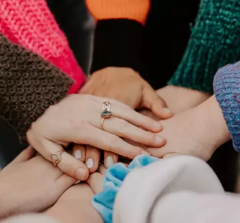 People's hands together
