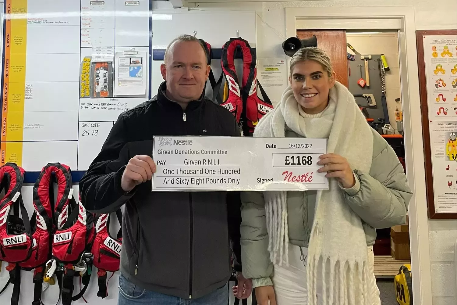 John Tait, volunteer crew member and Treasurer at RNLI and Anya Crombie, Training Administrator at Nestlé Girvan.