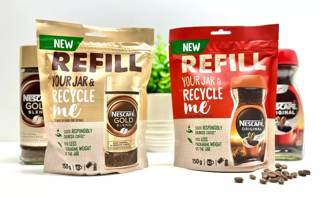 The new Nescafé refill pouches in front of glass coffee jars
