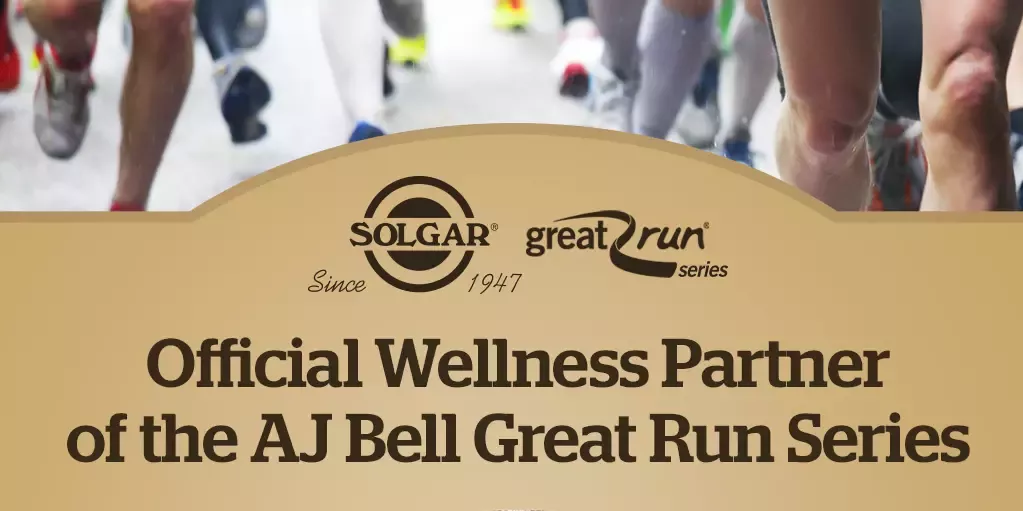 Solgar and Great Run logos on gold background with image of many runners' feet across the top