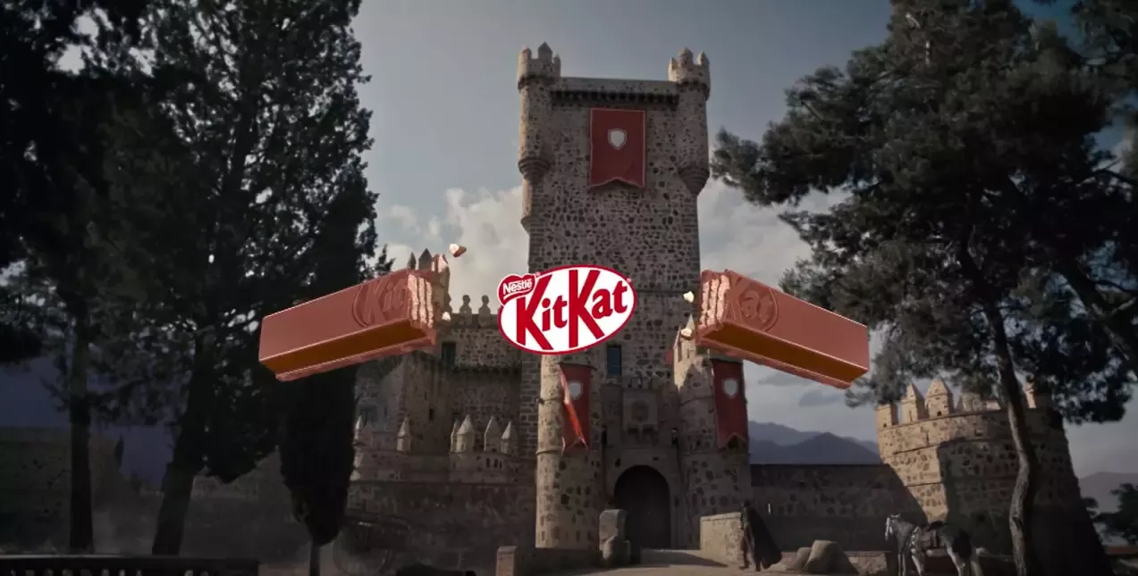 KitKat "Tech Frustrations" campaign video still - a KitKat finger is snapped in front of a medieval castle