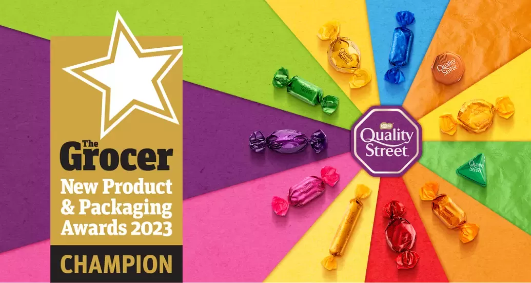 Quality Street paper wrappers on colourful background with The Grocer New Product and Packaging Award logo