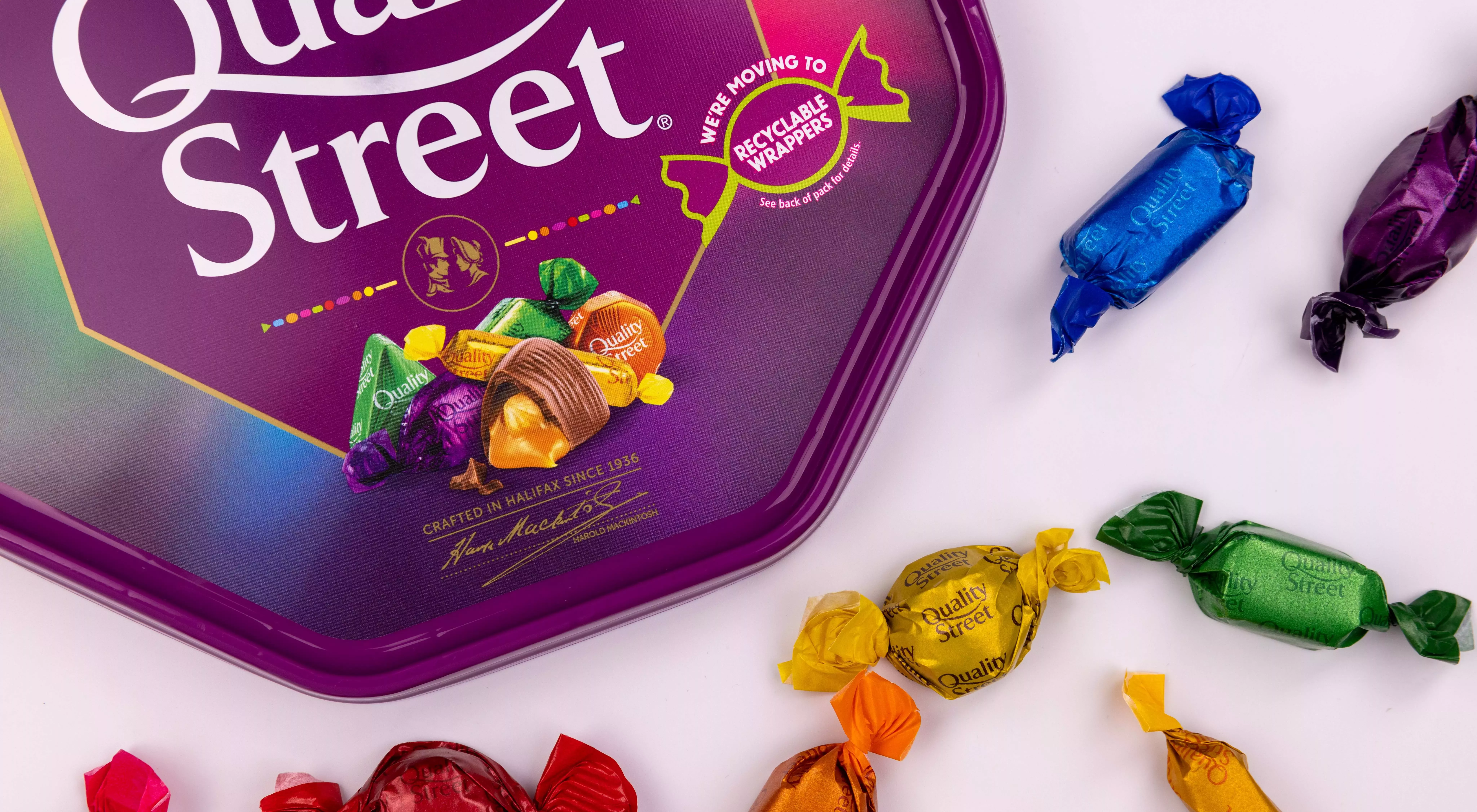 A box of Quality Street with recyclable paper packaging, displayed on a white background.