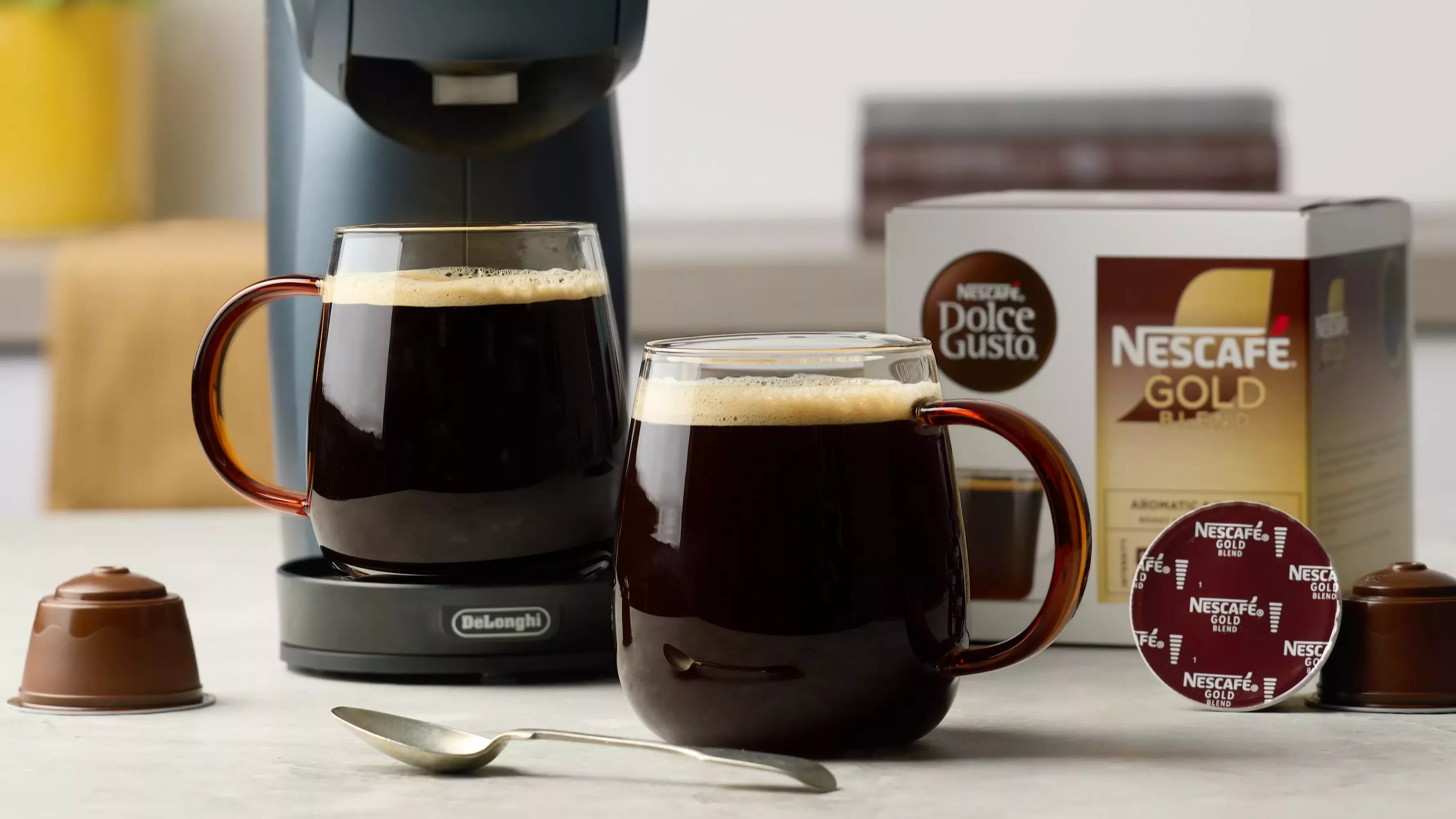 black coffee with dolce gusto machine and box