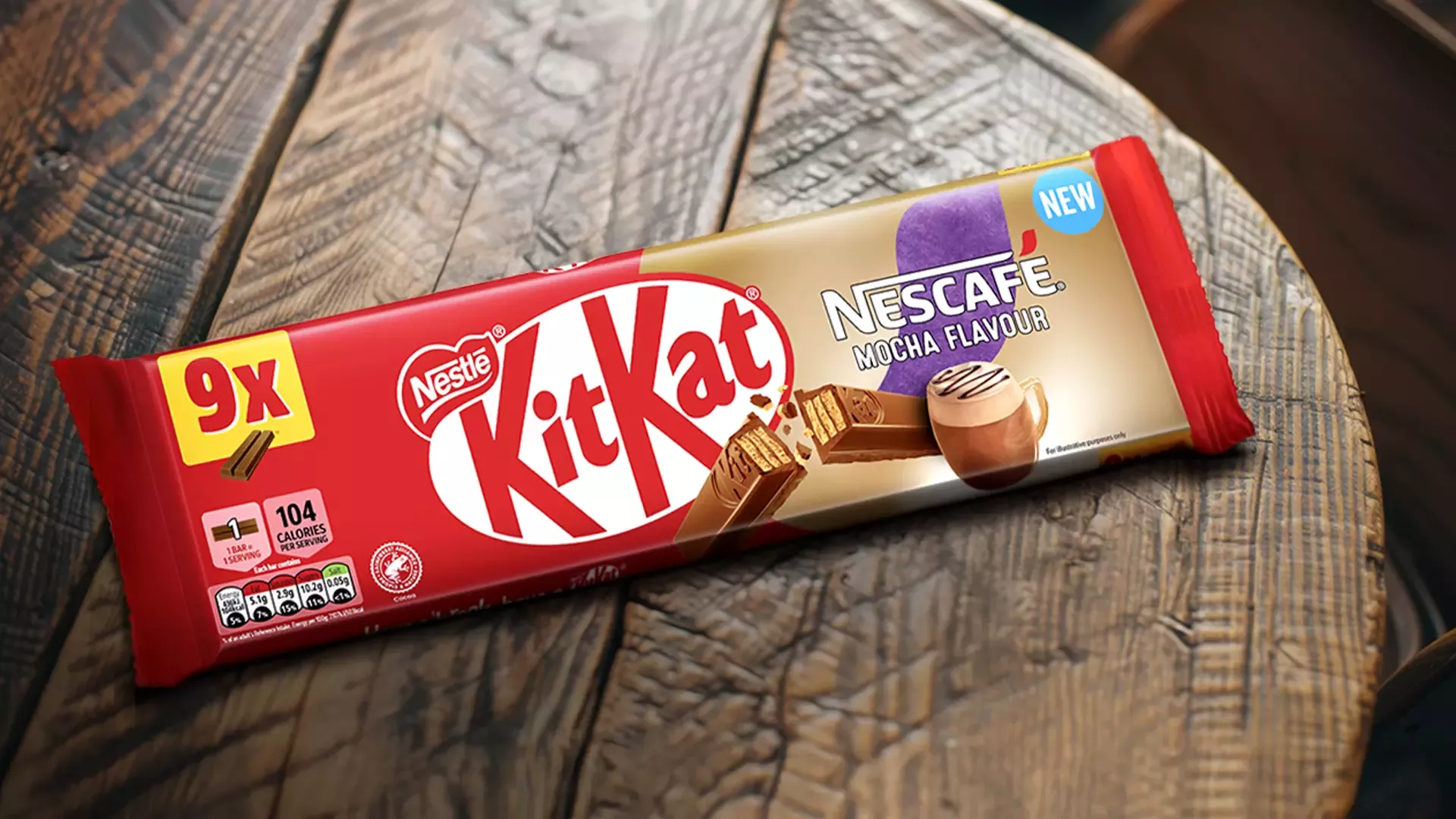 A landcape image of a 9 pack of mocha flavoured KitKat, the package is half red and half gold and purple, with Nescafé logo.