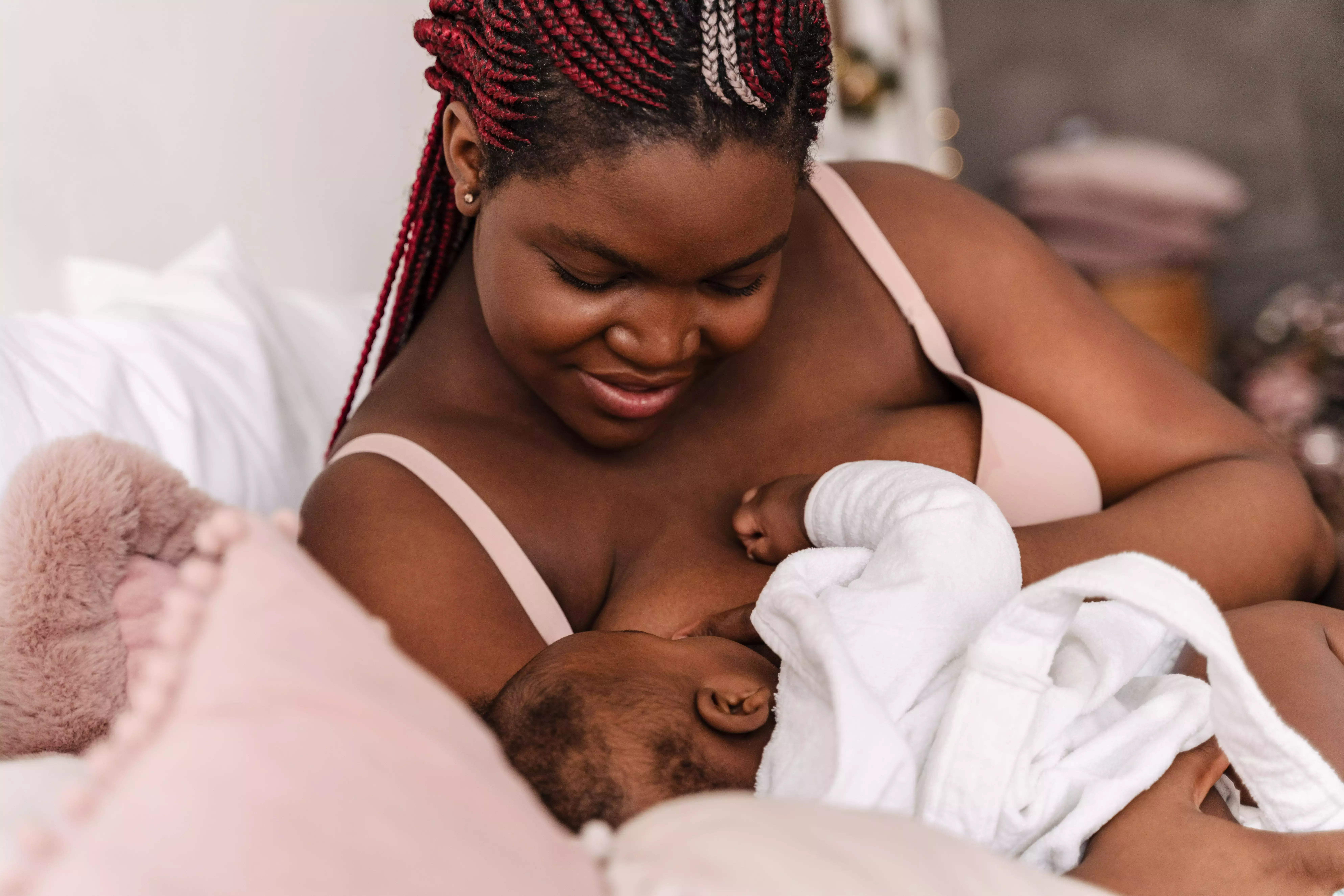 Woman breastfeeding baby