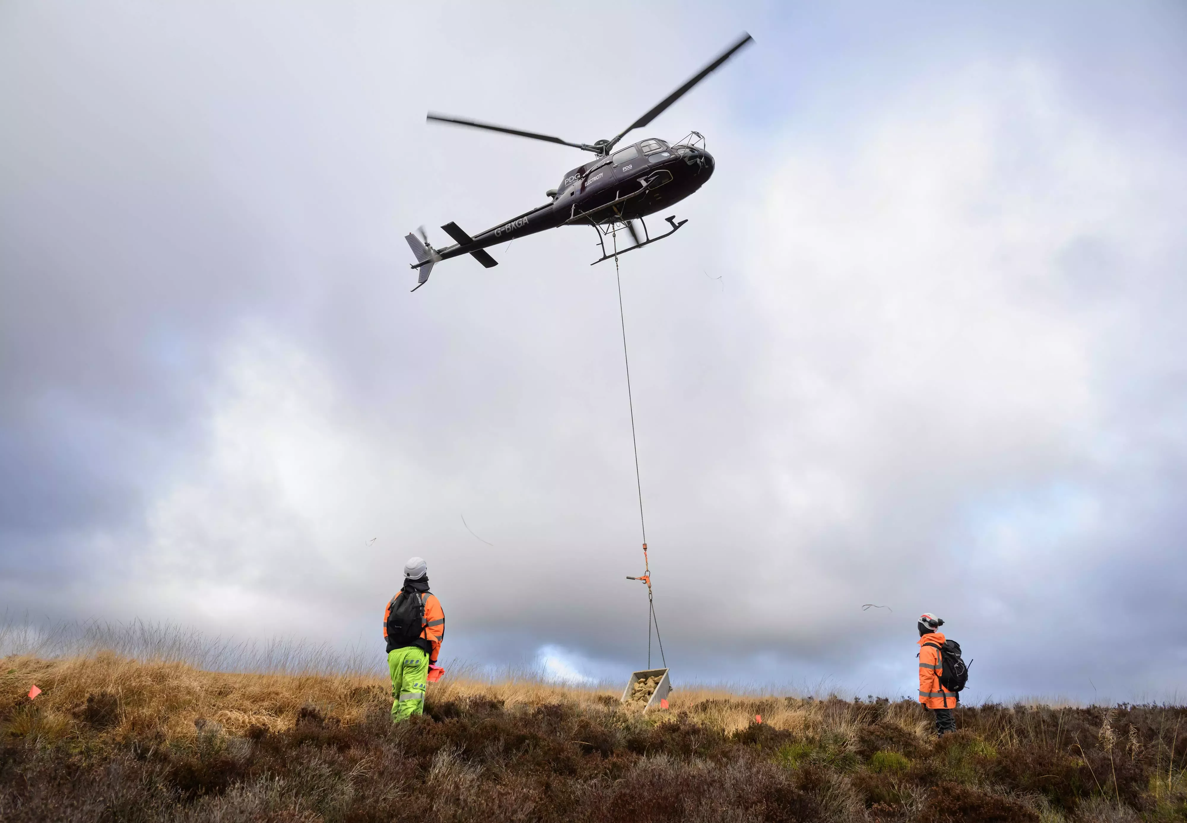 Helicopter flying over Comsb Moss
