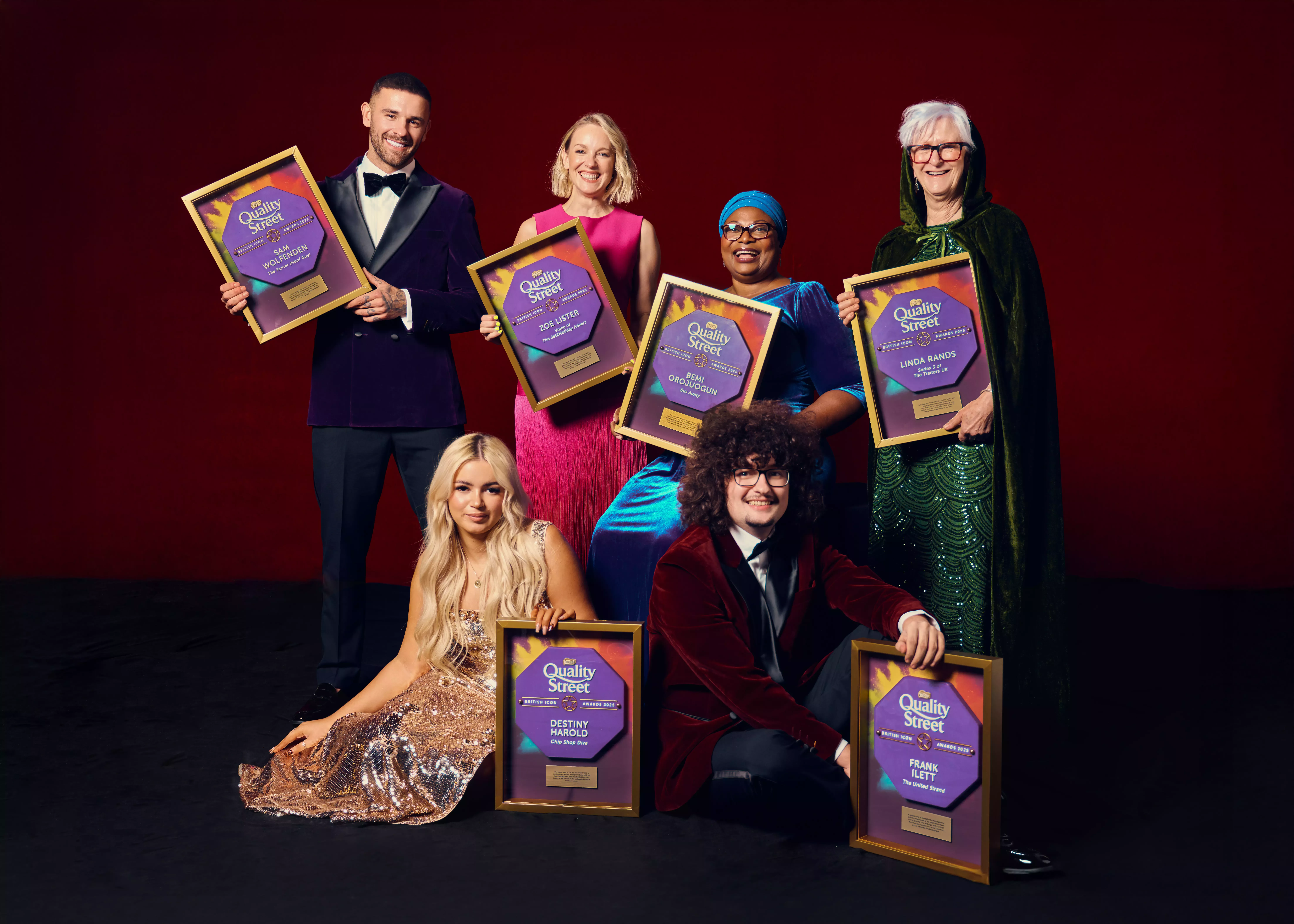 'British Icons' posing with their Quality Street plaques