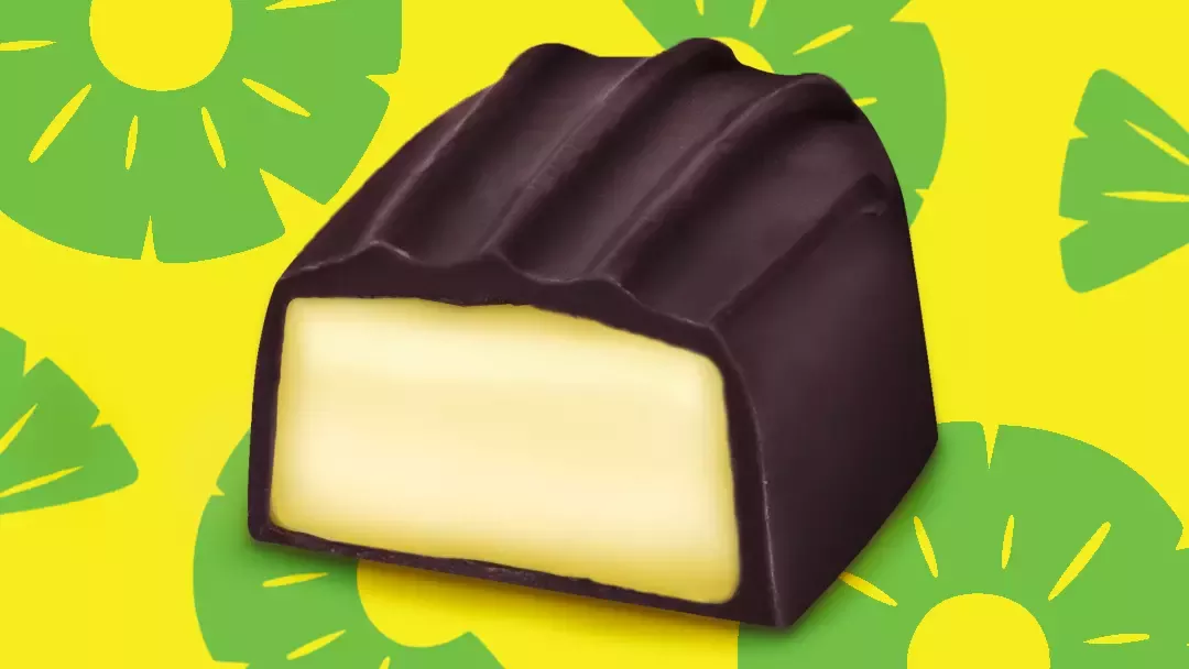 Pineapple Creme sweet in front of pineapple background