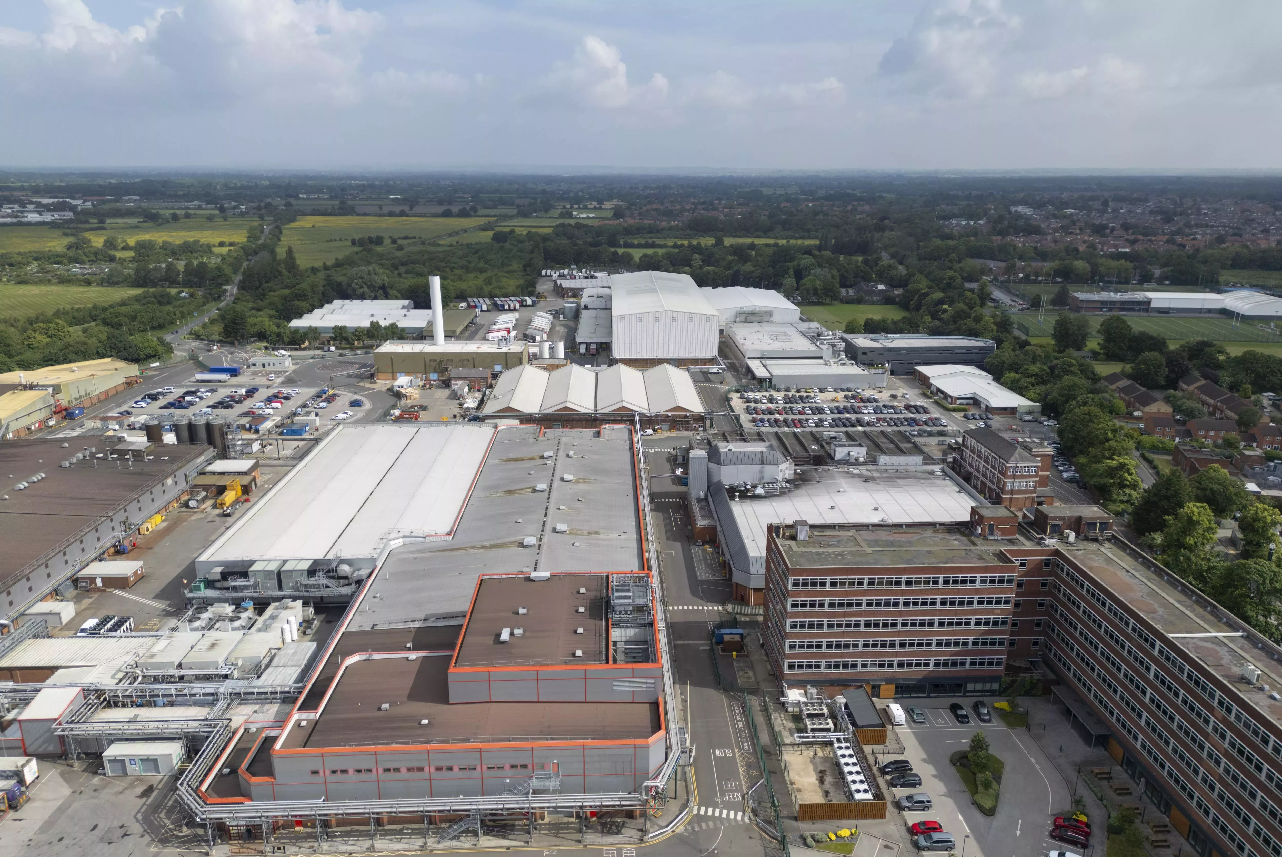A drone image of the entire Nestlé York site, including the York KitKat factory. A sunny backdrop against the site.