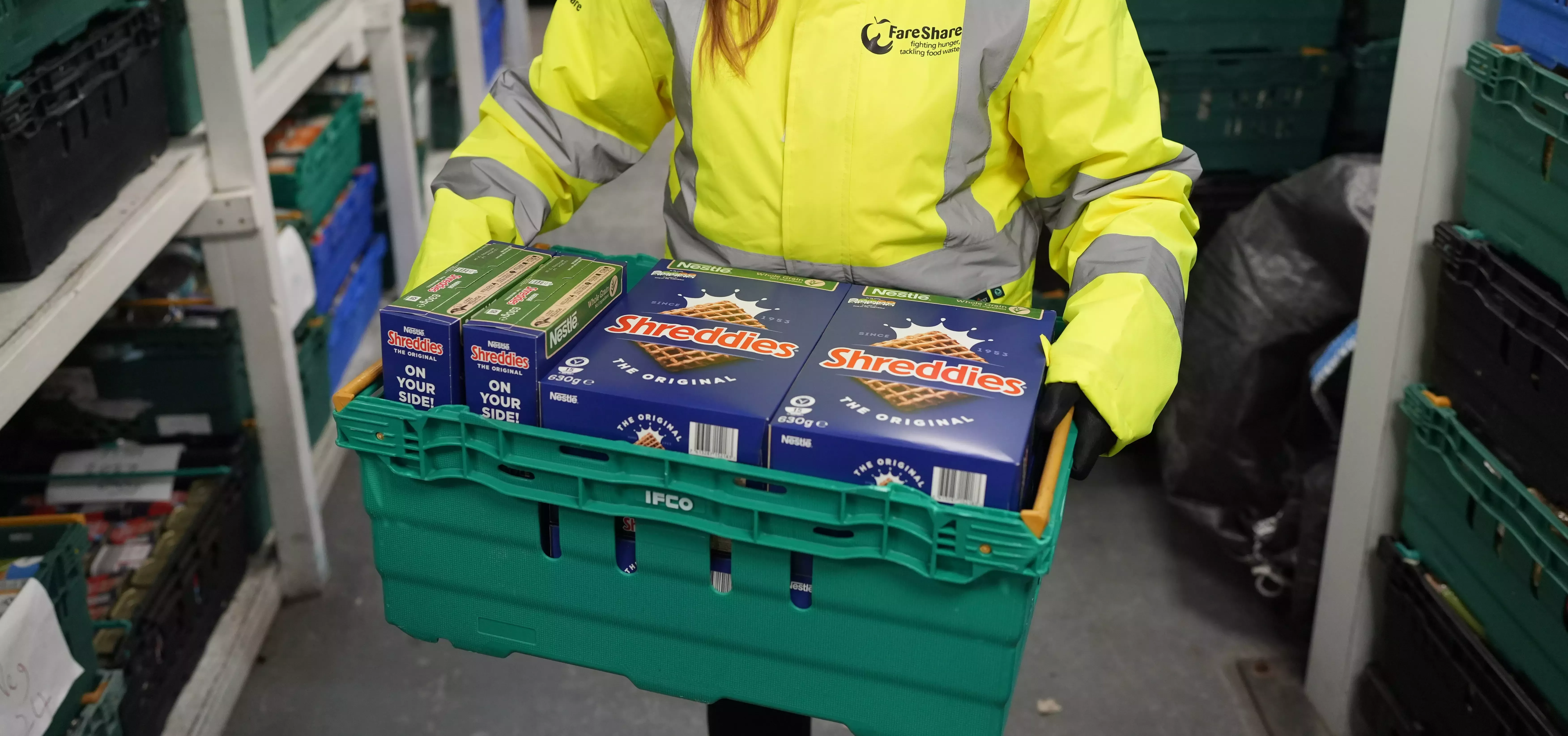 Plastic crate containing boxes of Shreddies