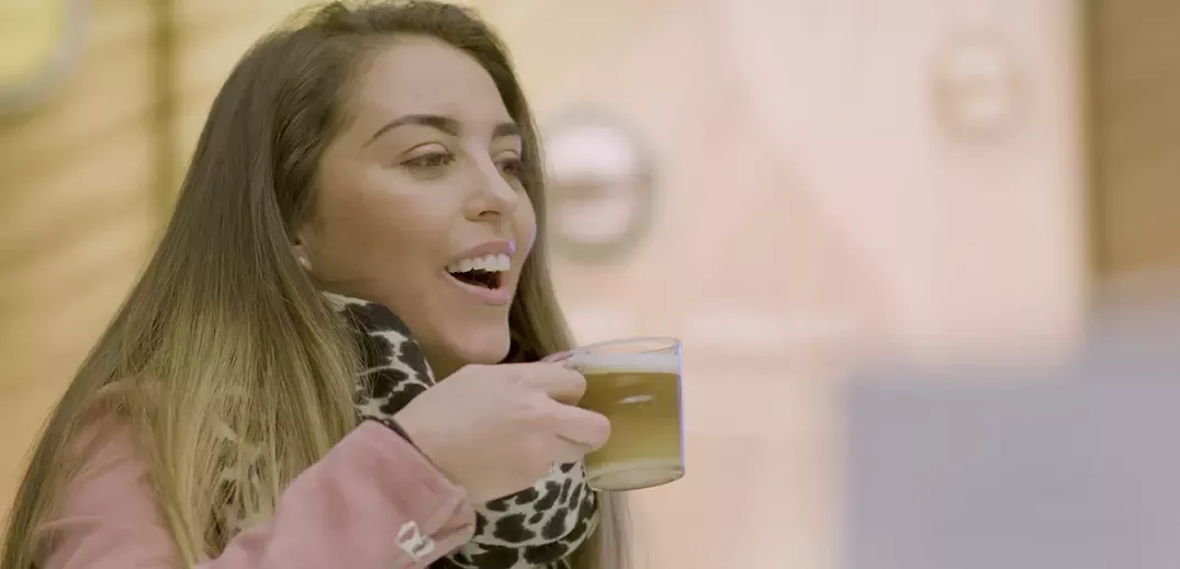 Girl having cup of coffee