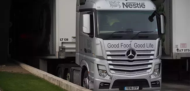 truck pulling out from nestle european transport hub at york